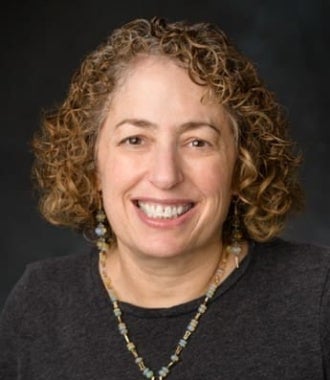 Headshot of Eve Riskin.